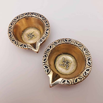 Brass Swastik Diya Pair - 1 inch Height | Sacred Symbol of Prosperity Brass Swastik Diya Pair - 1 inch Height | Sacred Symbol of Prosperity
