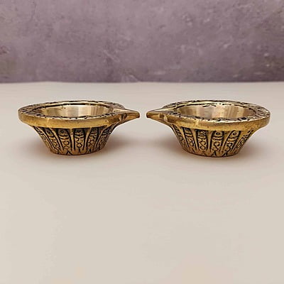 Brass Swastik Diya Pair - 1 inch Height | Sacred Symbol of Prosperity Brass Swastik Diya Pair - 1 inch Height | Sacred Symbol of Prosperity