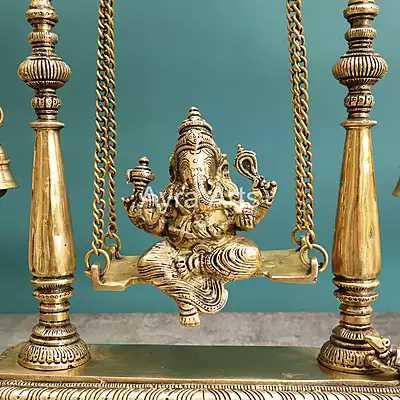 Brass Idol Ganesha Sitting on Swing jhula - 16 inch Height Brass Idol Ganesha Sitting on Swing jhula - 16 inch Height