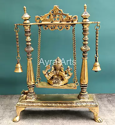 Brass Idol Ganesha Sitting on Swing jhula - 16 inch Height Brass Idol Ganesha Sitting on Swing jhula - 16 inch Height