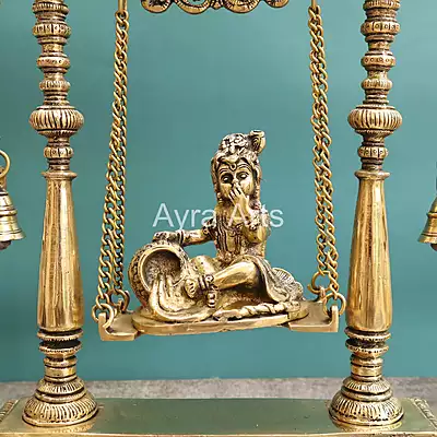 Brass Krishna Statue On Swing Butter Krishna Idol on Jhula for Home Decor Temple Mandir - 16 inch Height Brass Krishna Statue On Swing Butter Krishna Idol on Jhula for Home Decor Temple Mandir - 16 inch Height