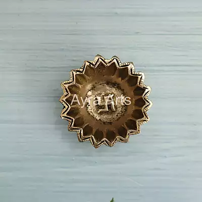Brass Sun Design Swastik Diya - 1 Inch Height Brass Sun Design Swastik Diya - 1 Inch Height
