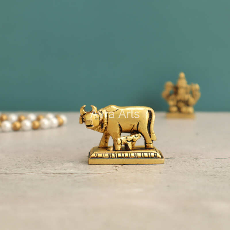 Small Holy Kamdhenu Cow and Calf Brass Statue - 1.5 Inch Height Small Holy Kamdhenu Cow and Calf Brass Statue - 1.5 Inch Height