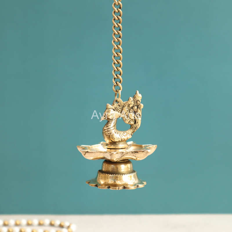 Brass Hanging Peacock Diya Lamp for Puja 7 Oil Wick with Chain for Home Decoration - 3 Inch Length Brass Hanging Peacock Diya Lamp for Puja 7 Oil Wick with Chain for Home Decoration - 3 Inch Length