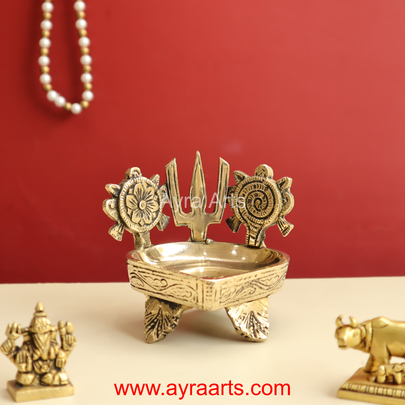 Buy Pure Brass Shanku Chakra Deepam - 3.8 Inch Height Buy Pure Brass Shanku Chakra Deepam - 3.8 Inch Height