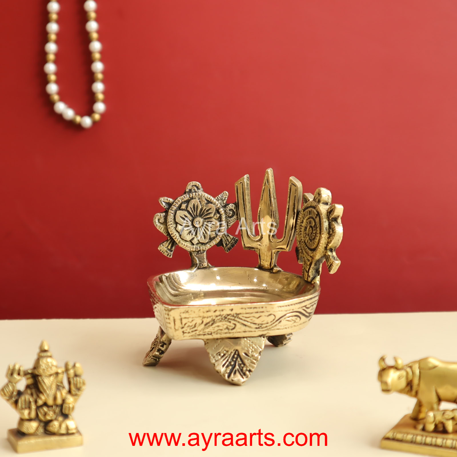 Buy Pure Brass Shanku Chakra Deepam - 3.8 Inch Height Buy Pure Brass Shanku Chakra Deepam - 3.8 Inch Height