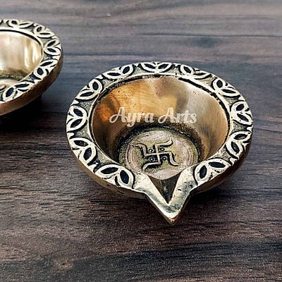 Brass Swastik Diya Pair - 1 inch Height | Sacred Symbol of Prosperity Brass Swastik Diya Pair - 1 inch Height | Sacred Symbol of Prosperity